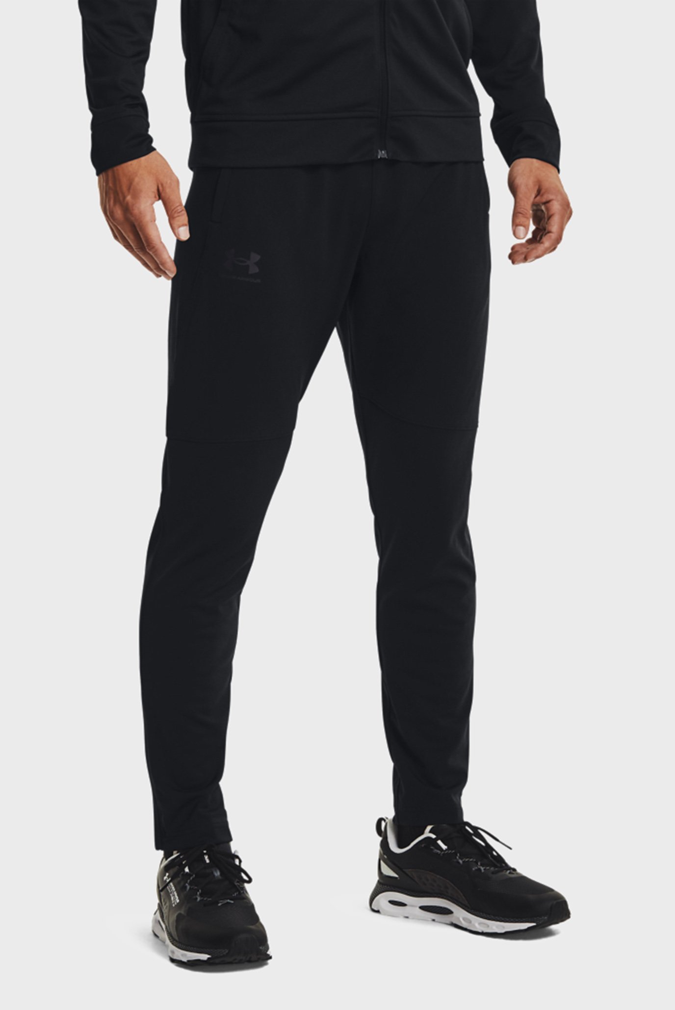 Мужские черные спортивные брюки UA PIQUE TRACK PANT 1
