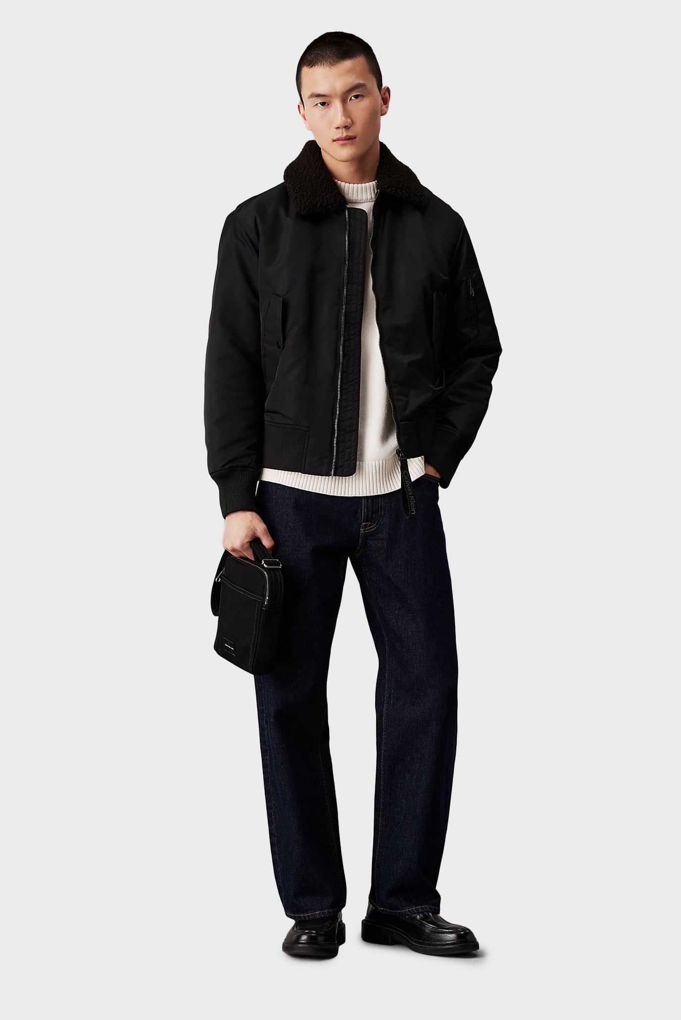 Мужская черная сумка SPORT ESSENTIALS REPORTER18 W 2