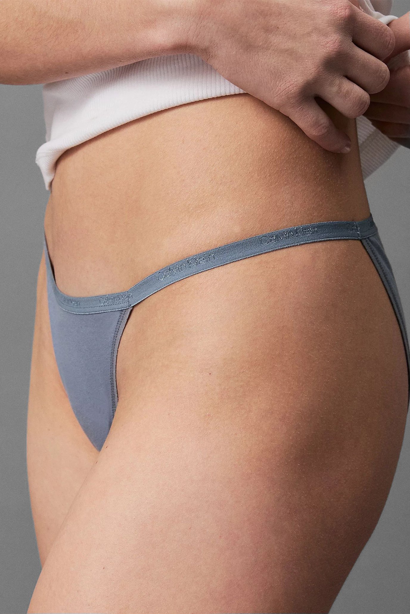 Трусы HIGH LEG STRING BIKINI MID-RISECalvin Klein Трусы HIGH LEG STRING BIKINI MID-RISE 4