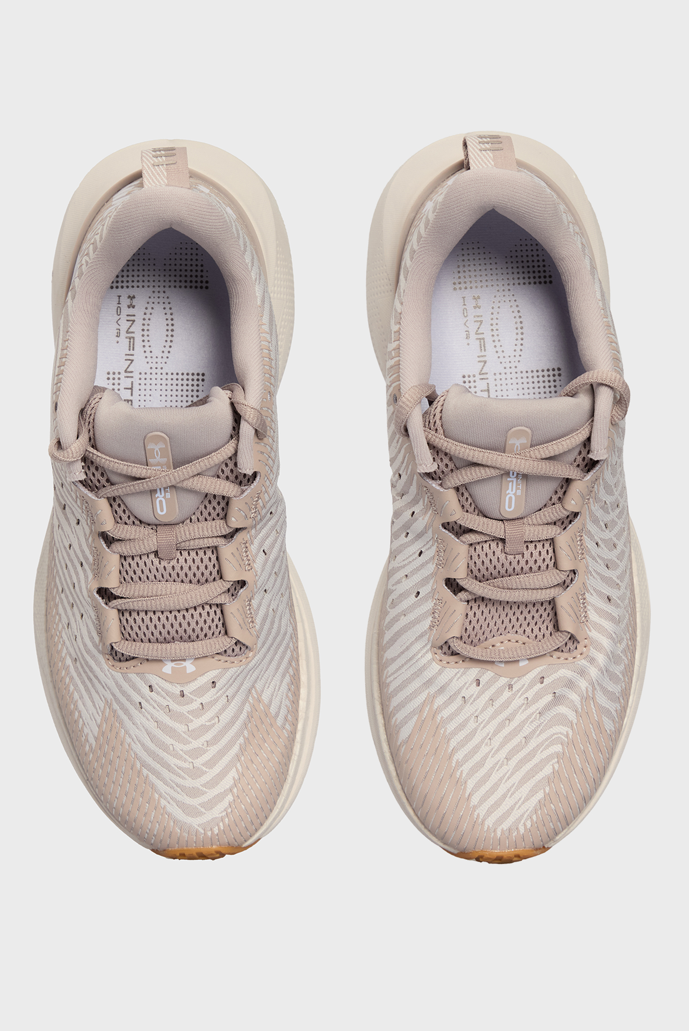 Женские пудровые кроссовки UA W Infinite Pro 4