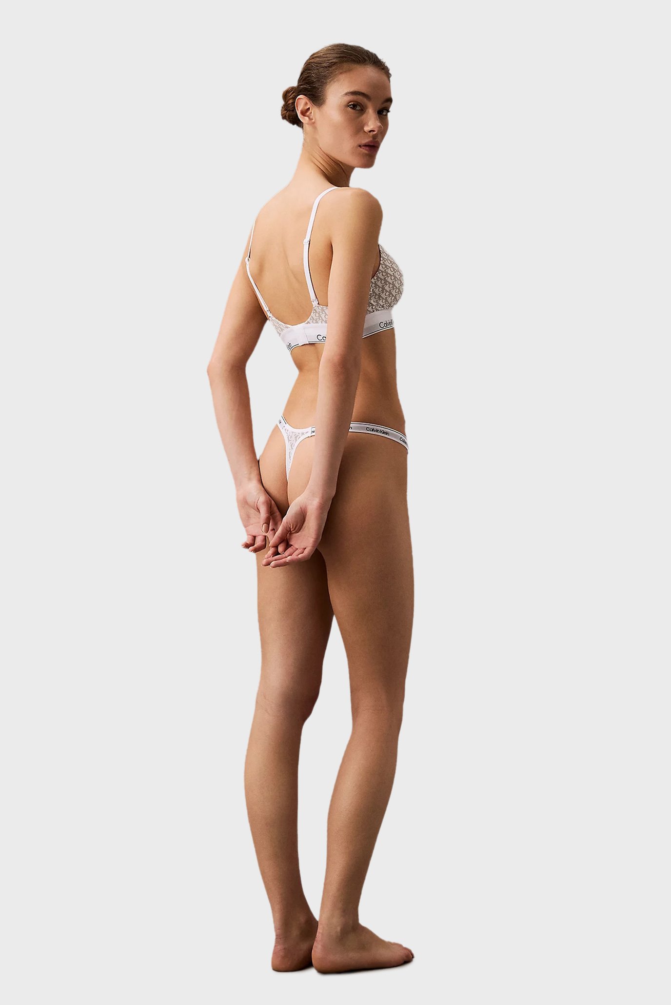 Женские трусики с узором DIPPED STRING THONGCalvin Klein Женские трусики с узором DIPPED STRING THONG 4