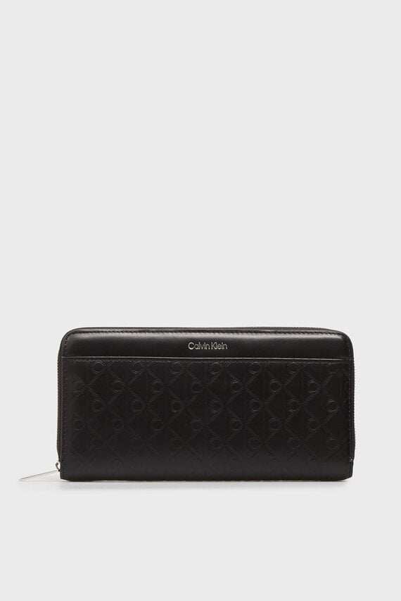 Кошелек EMBLEM AOP EMBOSSED LONG WALLET Calvin Klein Кошелек EMBLEM AOP EMBOSSED LONG WALLET Calvin Klein