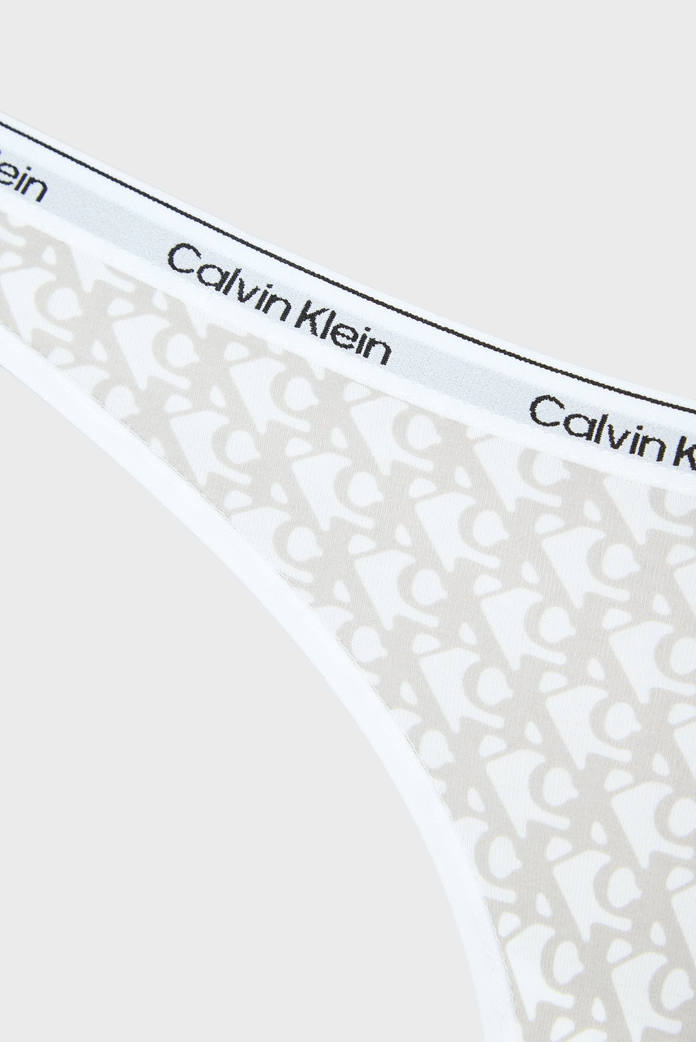 Женские белые трусики с узором THONGCalvin Klein Женские белые трусики с узором THONG 6