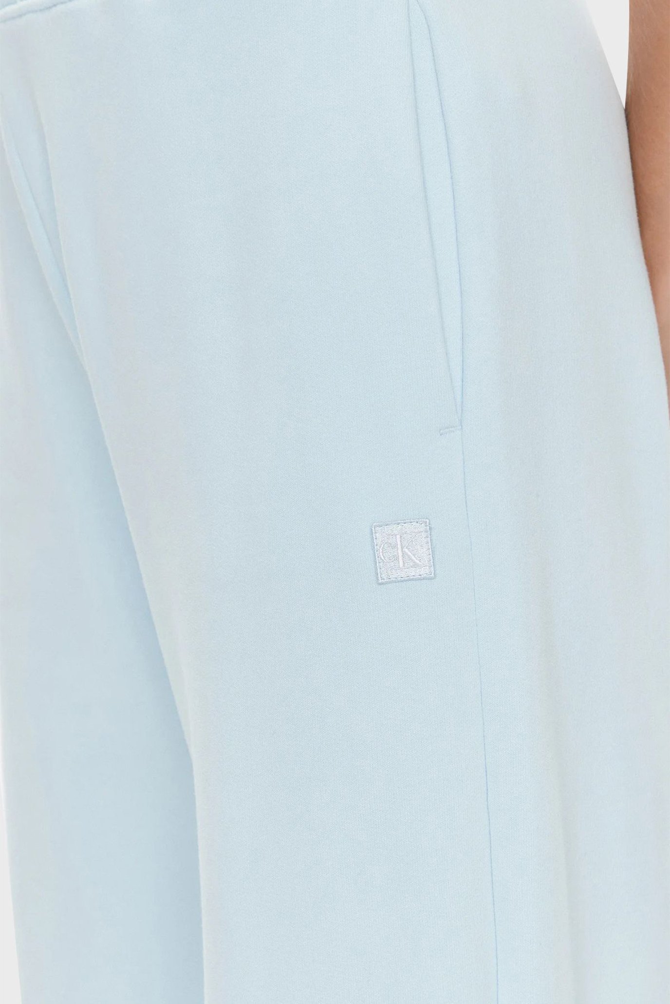 Женские голубые спортивные брюки CK EMBRO BADGE KNIT PANT 7