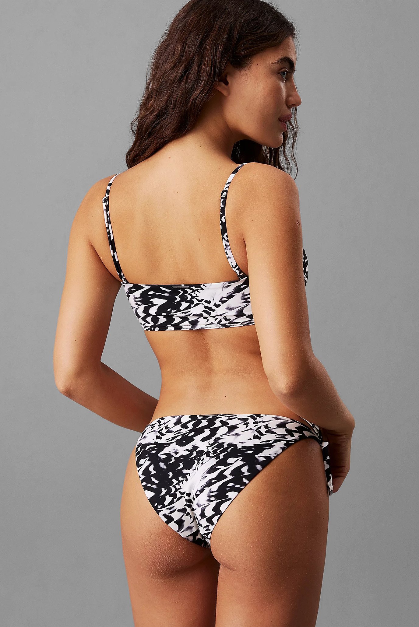 Женские трусики от купальника с узором STRING SIDE TIECalvin Klein Женские трусики от купальника с узором STRING SIDE TIE 2