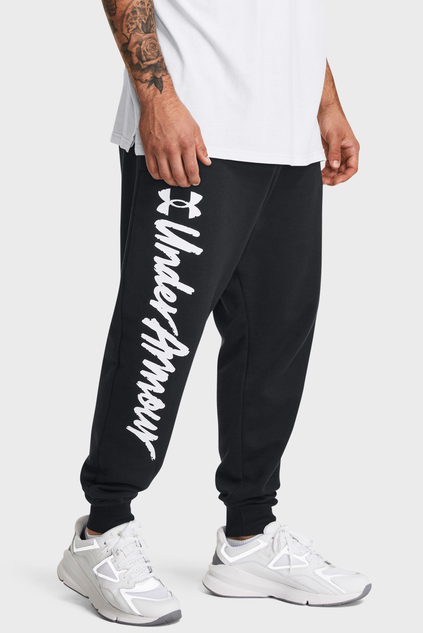 Мужские черные спортивные брюки UA Rival Fleece Graphic Jgrs 1