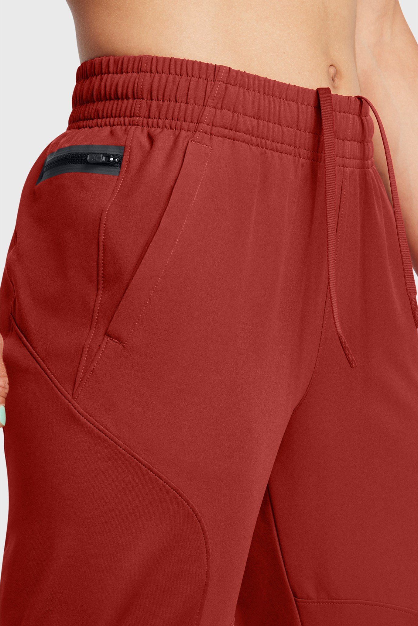 Женские красные спортивные брюки UA UNSTOPPABLE HYBRID 4