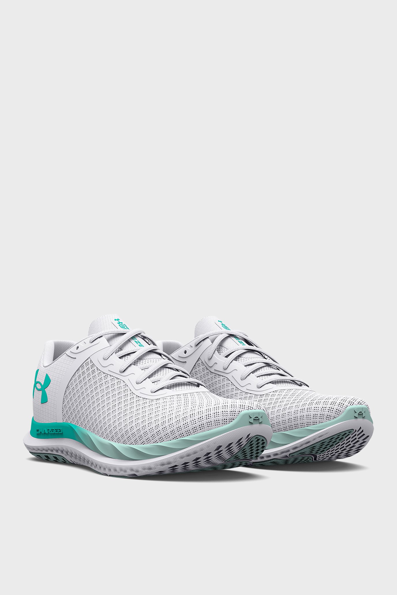 Женские белые кроссовки UA W Charged Breeze 2