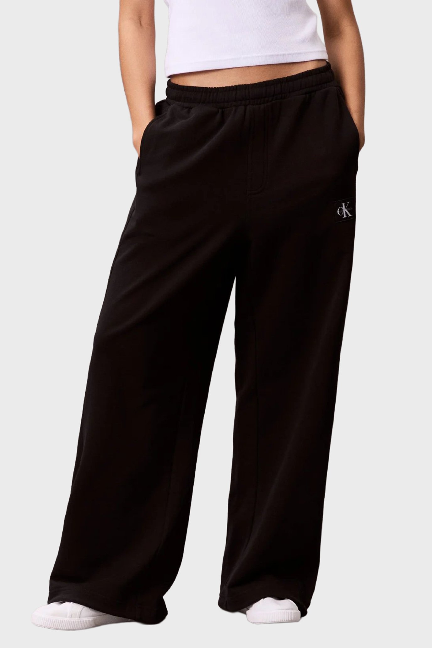 Штаны спортивные A- FRENCH TERRY BADGE LOGO PANTCalvin Klein Jeans Штаны спортивные A- FRENCH TERRY BADGE LOGO PANT 1