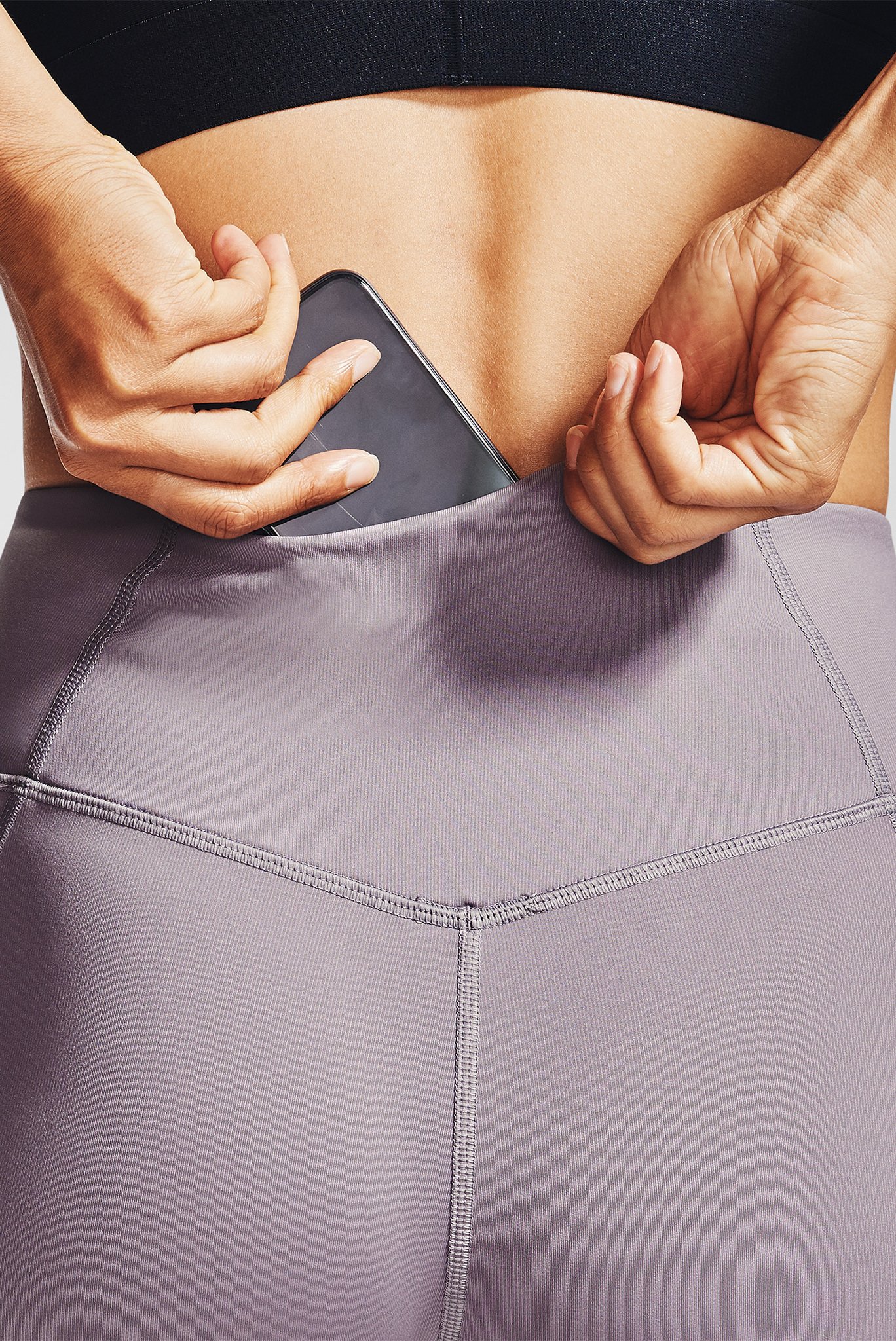 Женские розовые тайтсы UA Rush Crop 3