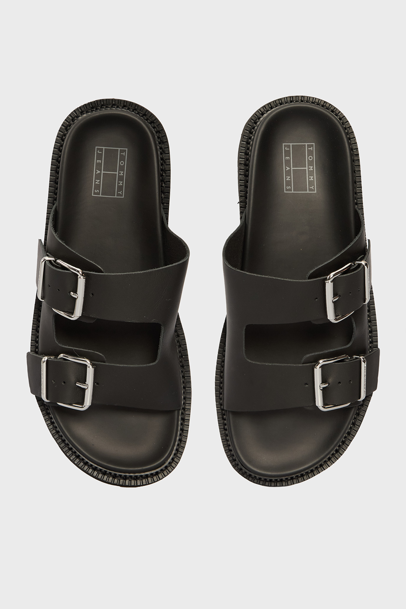 Женские черные кожаные слайдерыTommy Jeans Женские черные кожаные слайдеры 4