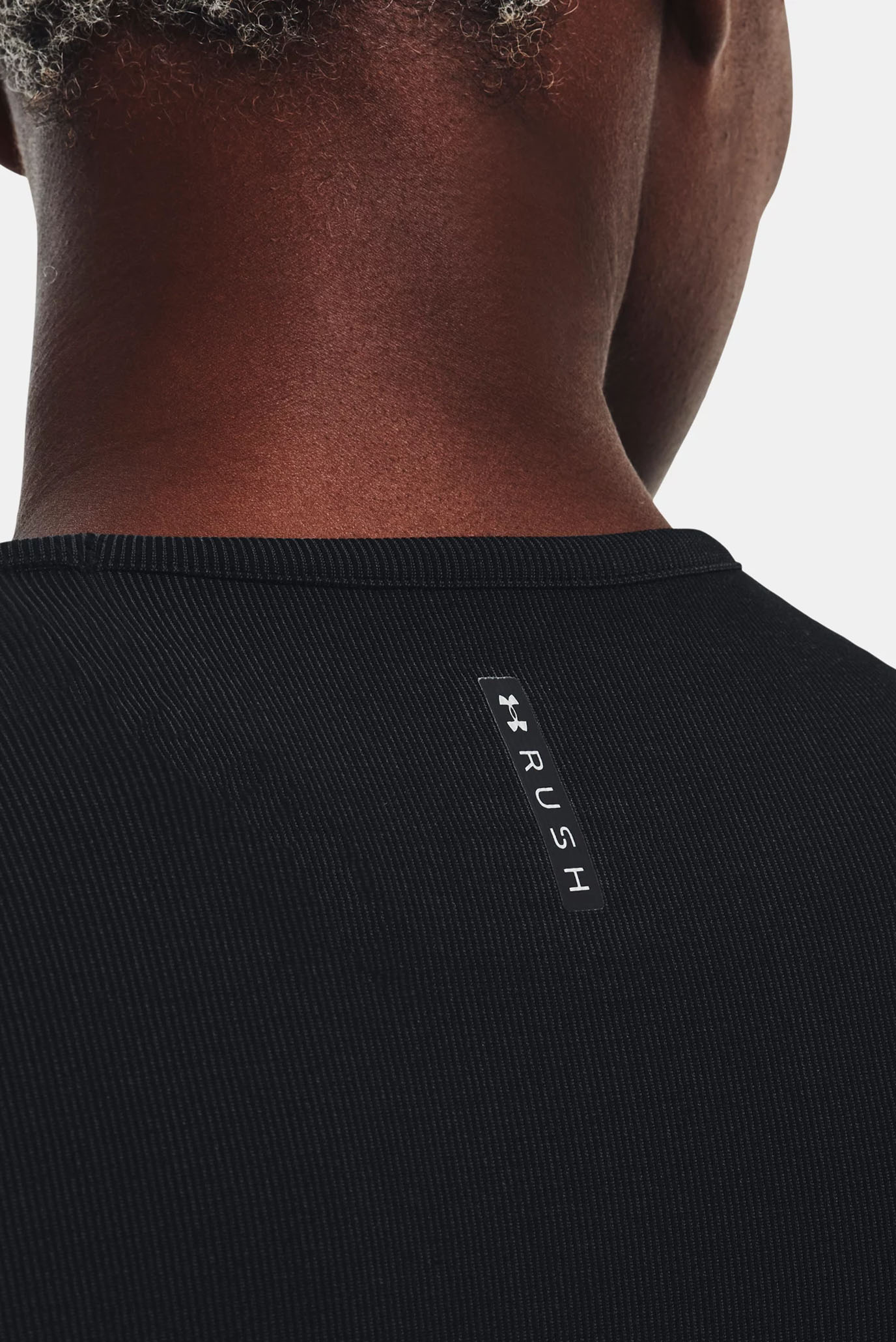 Женская черная футболка UA Rush Seamless SS 4