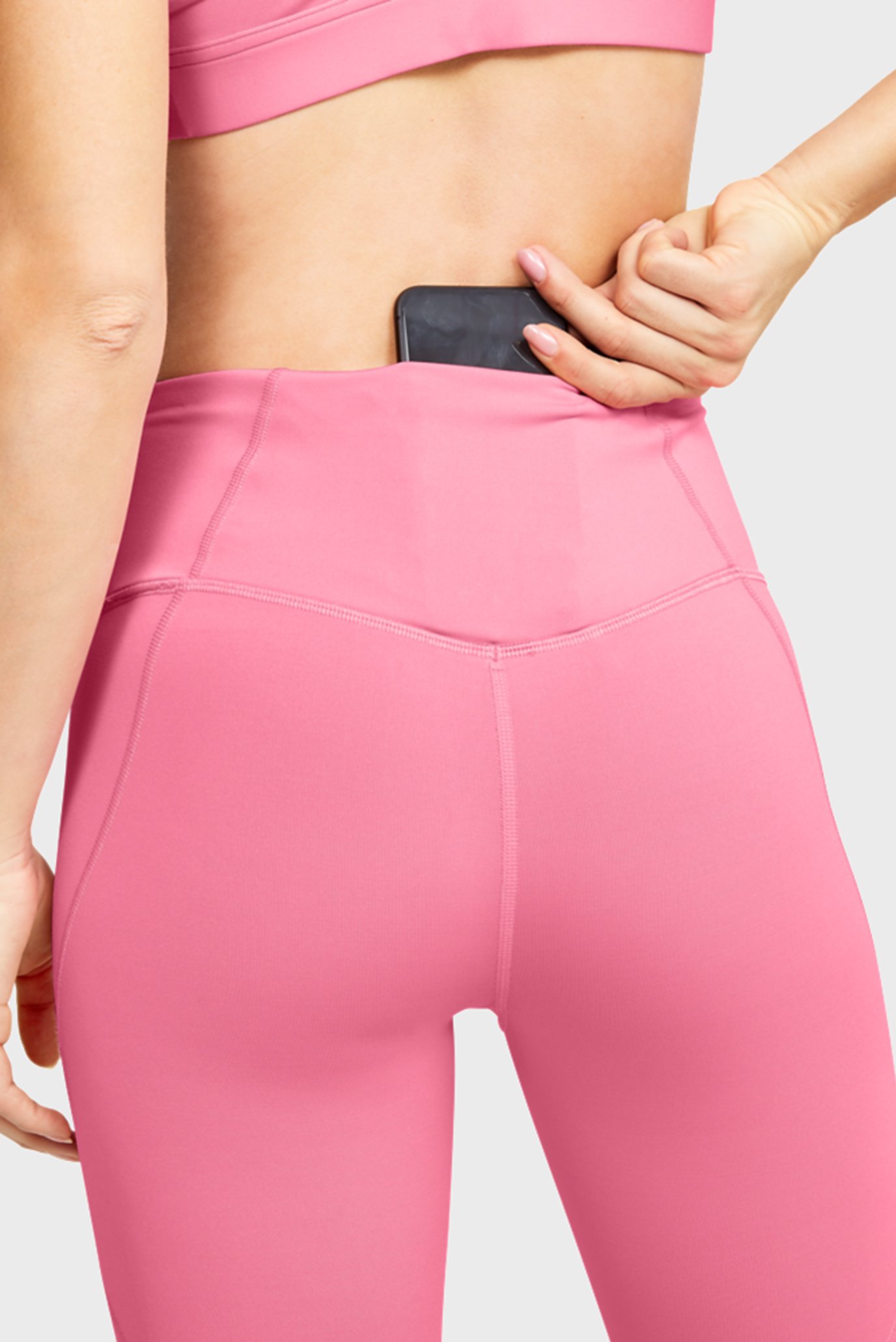 Женские розовые тайтсы UA Rush 6