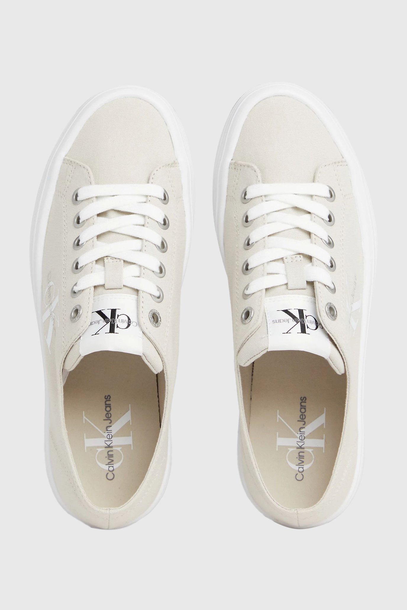 Calvin klein ireland canvas white plimsoll trainers best sale