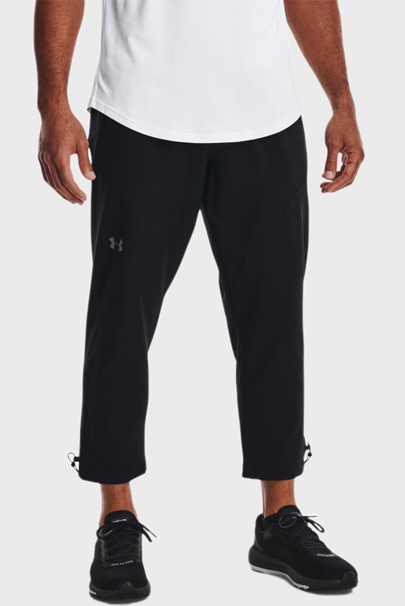 Мужские черные спортивные брюки UA Unstoppable Crop Pant 1