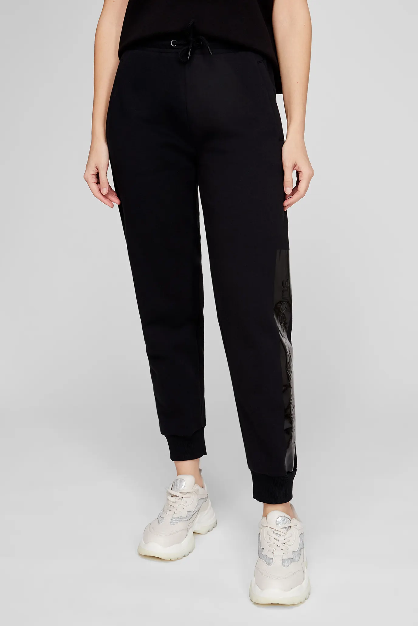 Женские черные спортивные брюки 11